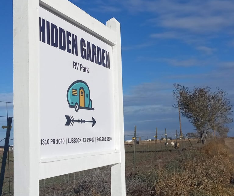 Hidden Garden RV Park entrance sign at 4310 Private Road 1040, Lubbock, Texas 79407 - full hook ups