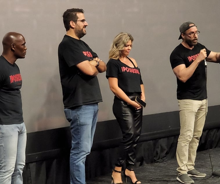 a group of people standing on a stage