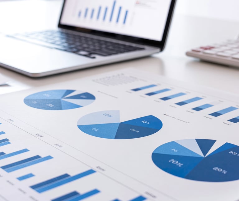 Clean financial reports and charts showing organized bookkeeping and clear financial visibility.