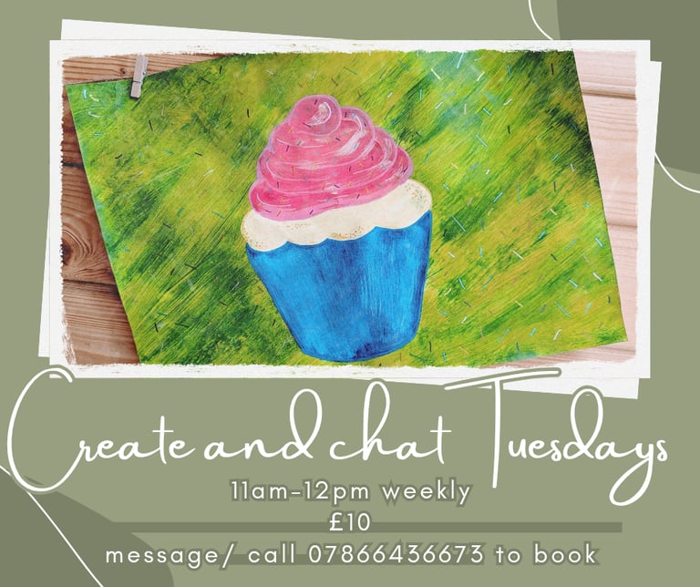 a cupcake with a pink and white cupcake on it