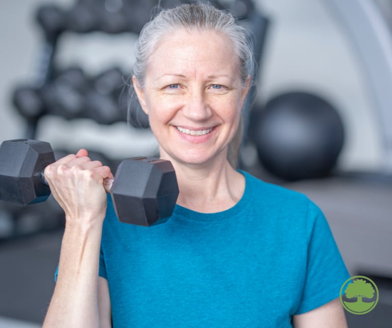 a woman doing strength training with a dumbbell in her hand