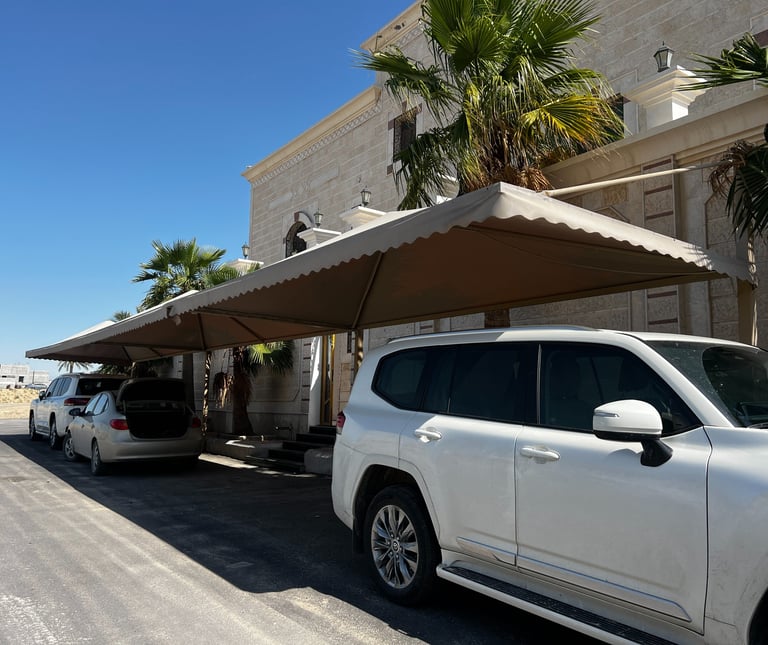 Commercial parking shade structures by Al Naim Fabrication.