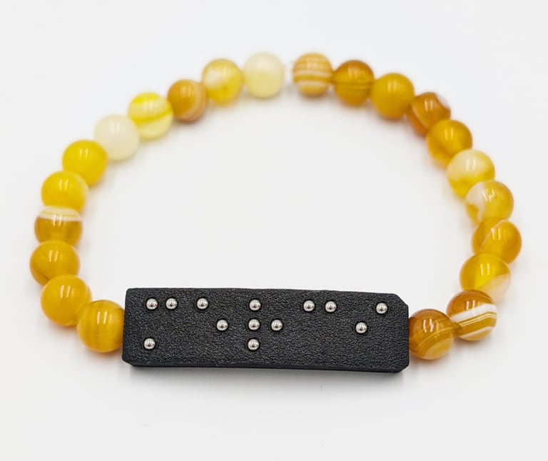 Bracelet perle Agate jaune chauffée, avec plaque braille Merci.