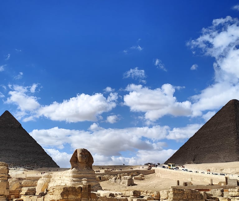 The Great Sphinx of Giza with the pyramids in the background