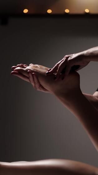 a woman is shown in a photo while she is doing a massage