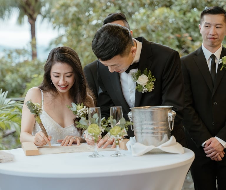 a man and woman are standing in front of a table
