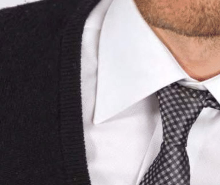 a close of a man wearing a shirt with a tie by the brand Monti