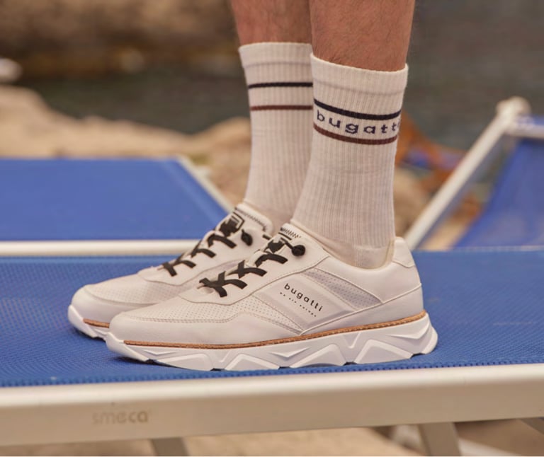 a person wearing bugatti socks