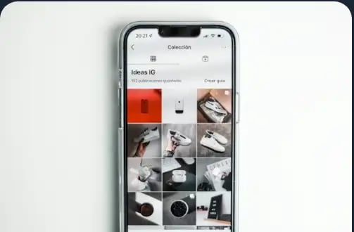 Smartphone displaying curated Instagram collection titled 'Ideas IG' with saved posts.