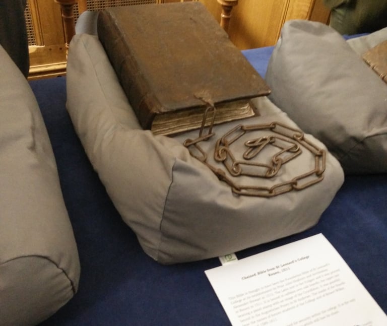 A bound manuscript with a chain.