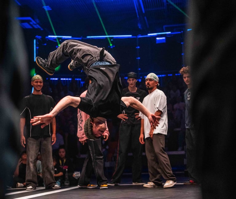 a man doing a trick in breaking battle