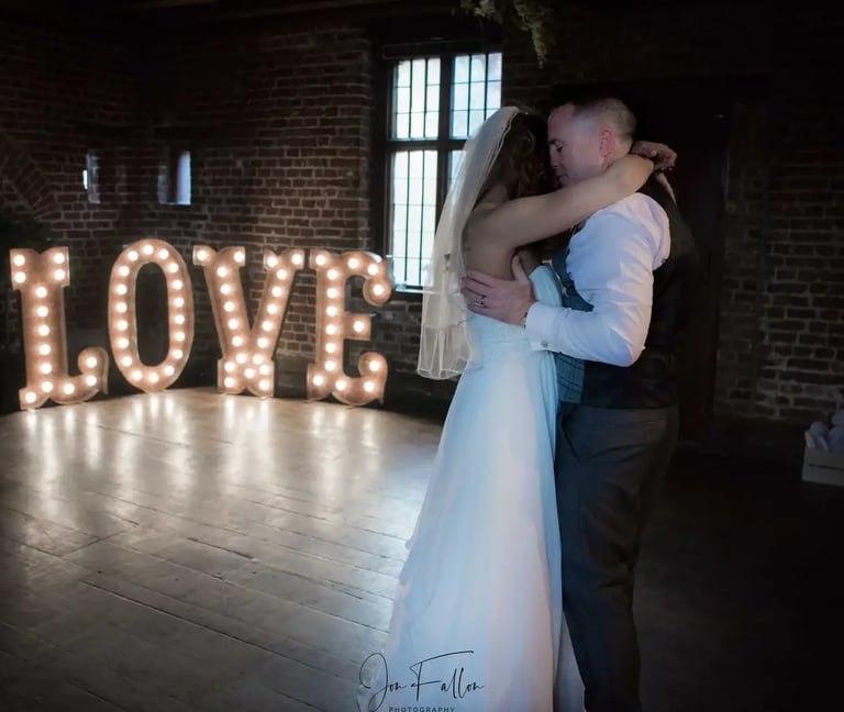 newly-weds having their first dance at Tudor Barn Eltham