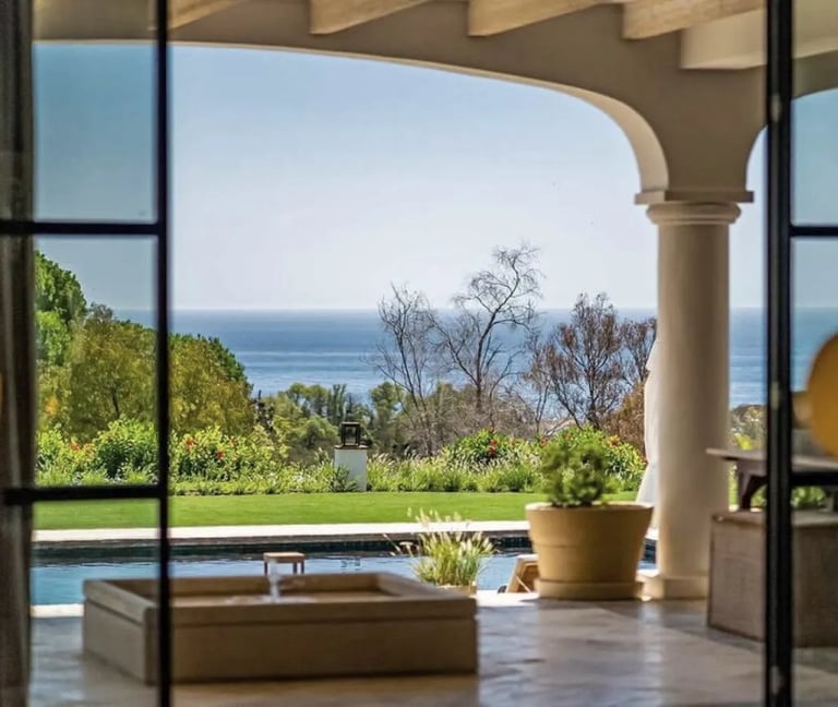 Covered terrace at Villa La Gratitud with sea views and al fresco dining
