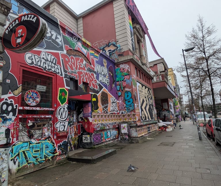 Rote Flora in Hamburg with graffiti and street art, St. Pauli Szene mit urbaner Kunst und alternativer Kultur