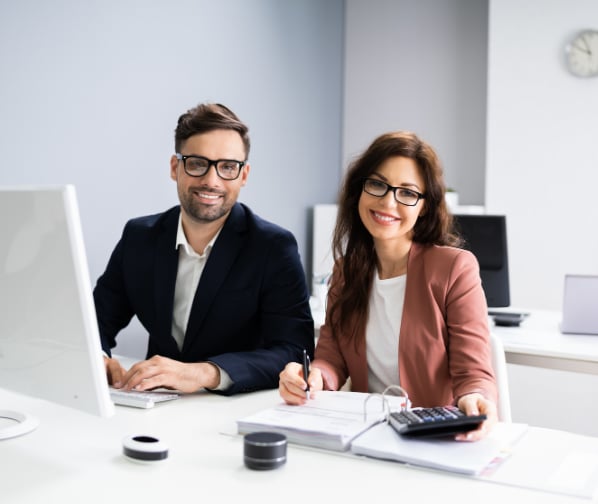 image of man and woman at accountant office smiling