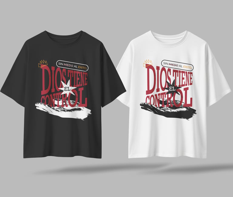 Black and white oversized graphic t-shirts featuring the Spanish religious text Dios Tiene El Control.
