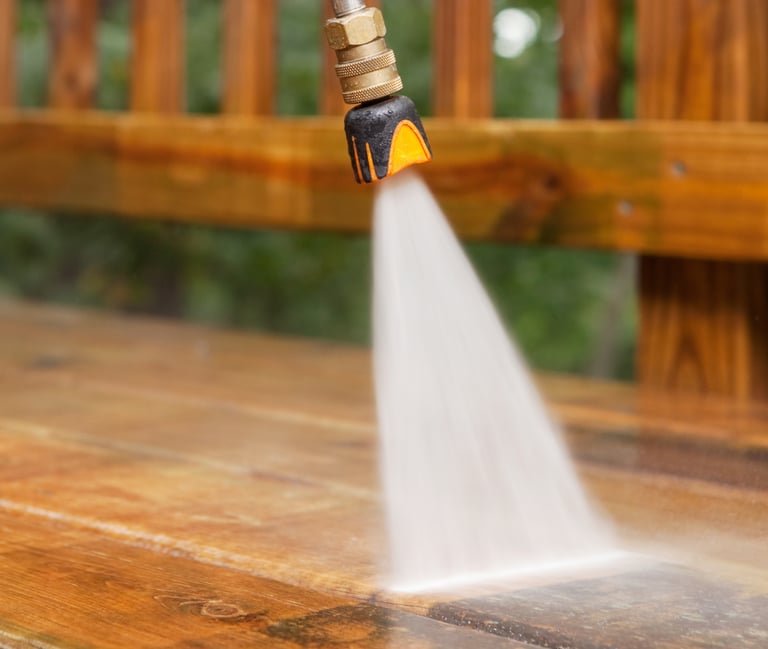pressure washer washing a homeowners deck