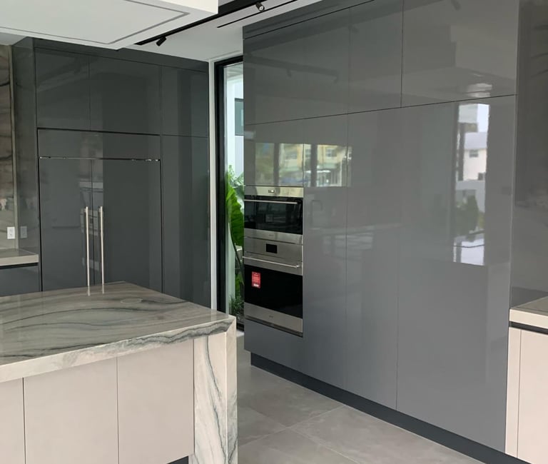 a kitchen with a marble counter top 