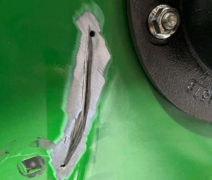 deep scrape in farm equipment