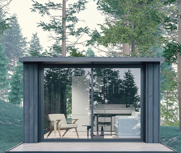 a small cabin with a glass door and a patio table