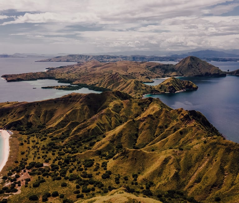 a view of a beach with a boat in the water
