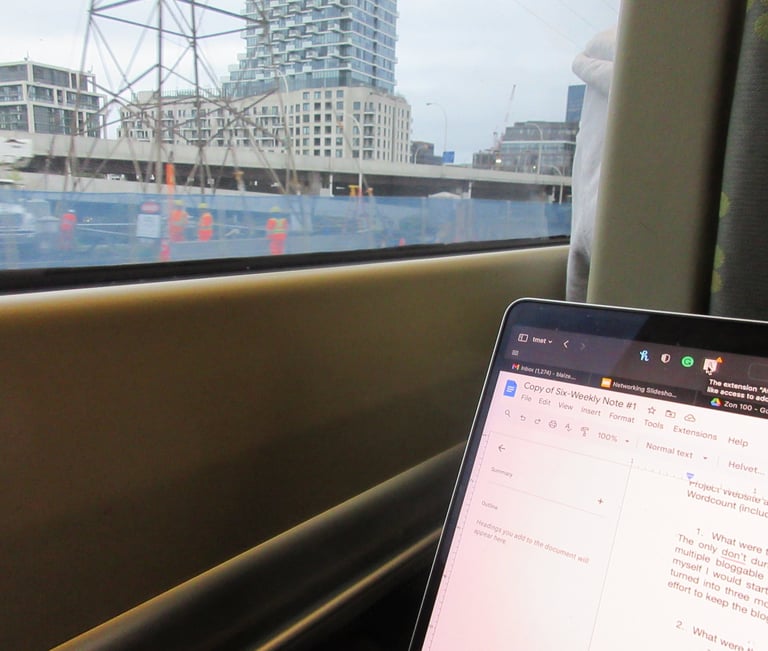 a laptop computer sitting on a table with a laptop on it