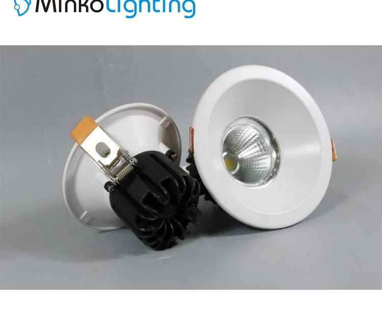 MNK-S5C a white light bulb on a white surface with a white light bulb