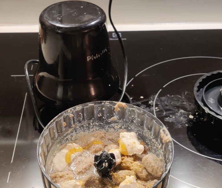 a bowl of food on a stove top