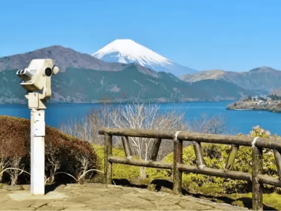 View of Lake Ashi and distant Mount Fuji from an observation deck.