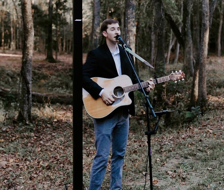Reagan performing for an outdoor wedding ceremony