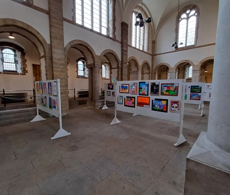 Large event showing paintings by children affected by war