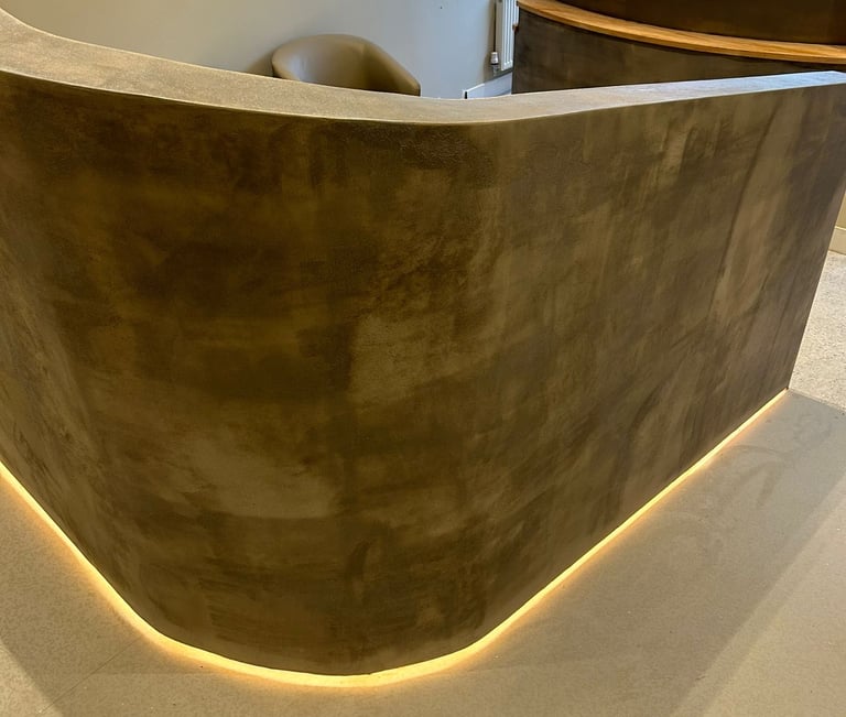 a reception table with a curved reception table