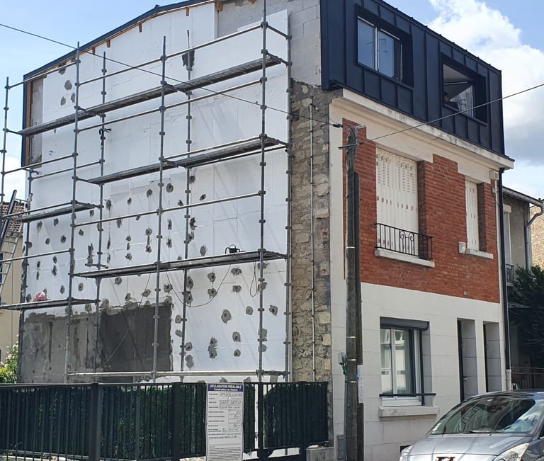 Surelevation of a house with zinc