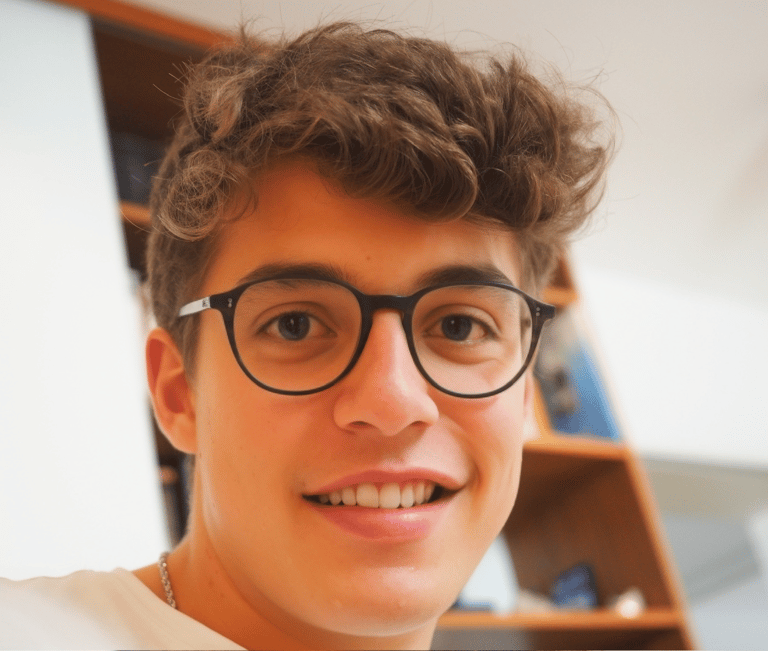 a man with glasses and a tie on his neck