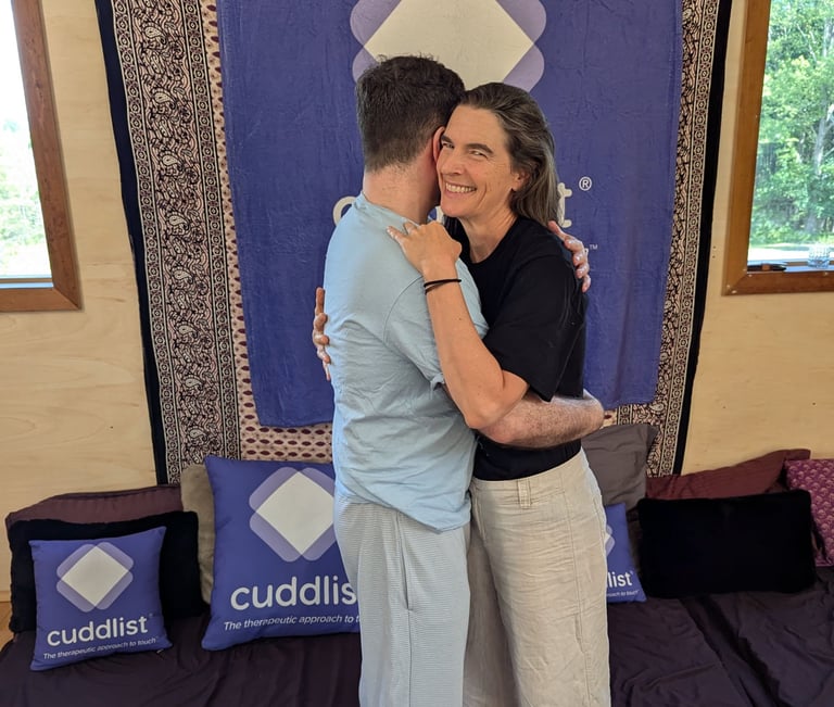 standing hug with Cuddlist branding. Photo by Keeley S
