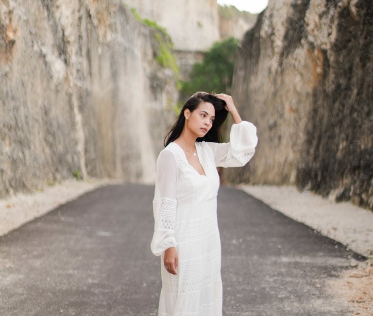 Elegant portrait of Ayunda mother captured along the cliffs at Melasti Beach Bali.
