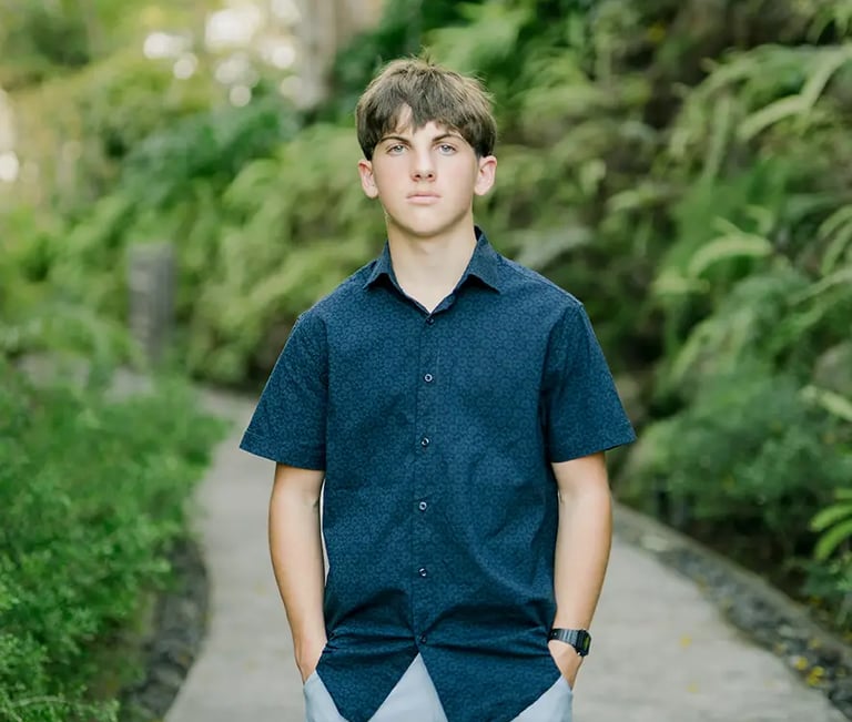 Teenage son portrait during a family photography session at AYANA Resort Bali