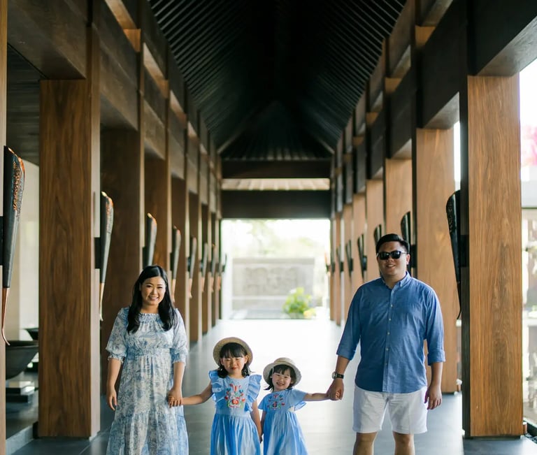 Family walking through the Grand Lobby at The Apurva Kempinski Bali