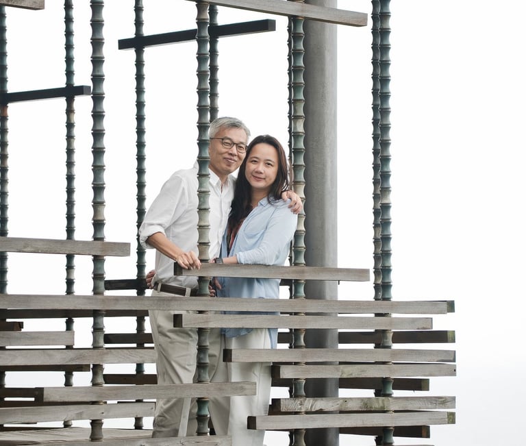 Mother and children framed within architectural lines at Alila Villas Uluwatu Bali in a quiet and intimate moment  