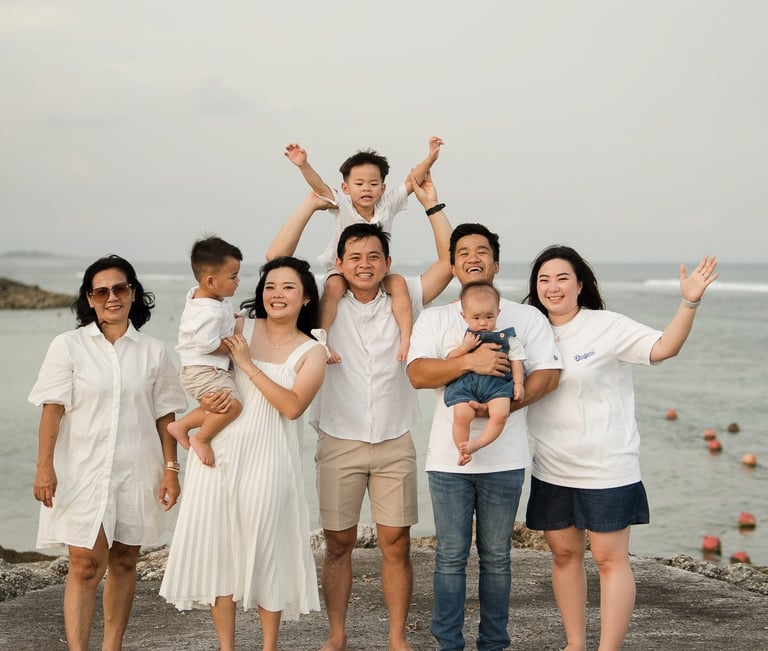 Multi generation family celebrating together during a Bali family photography session at The Apurva Kempinski Nusa Dua