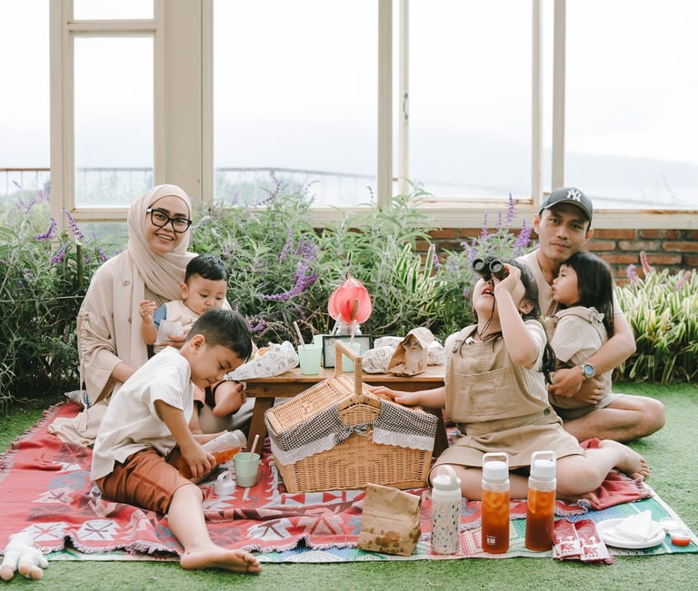 Family picnic portrait during a family photography session at Rumah Gemuk Bedugul Bali.