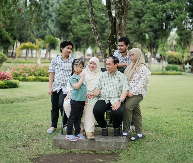 Family photography session near Ulun Danu Lake in Bedugul Bali with scenic mountain atmosphere.