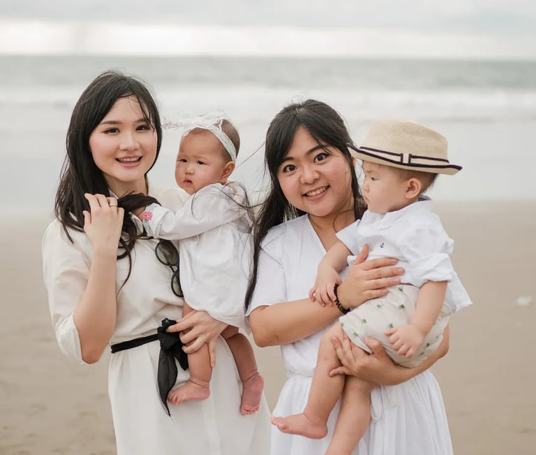 Multigeneration family moment at Alila Seminyak Bali with natural interaction and soft coastal light.