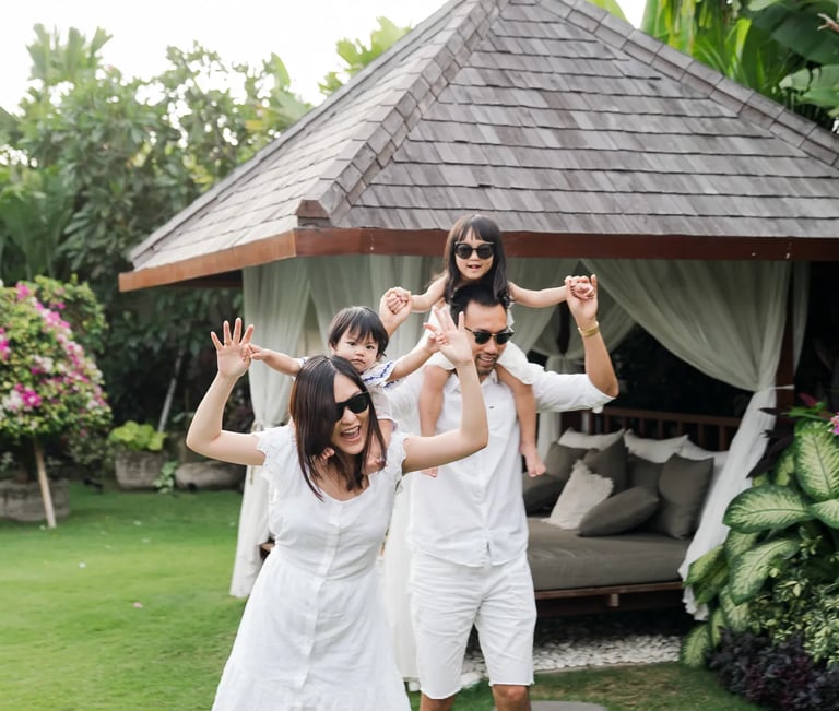 Family portrait at a tropical private villa in Seminyak Bali.