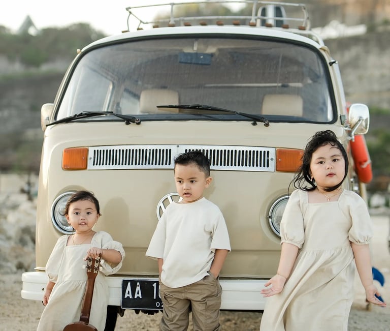 Candid children portrait during Ilham family beach photography session at Melasti Beach Bali
