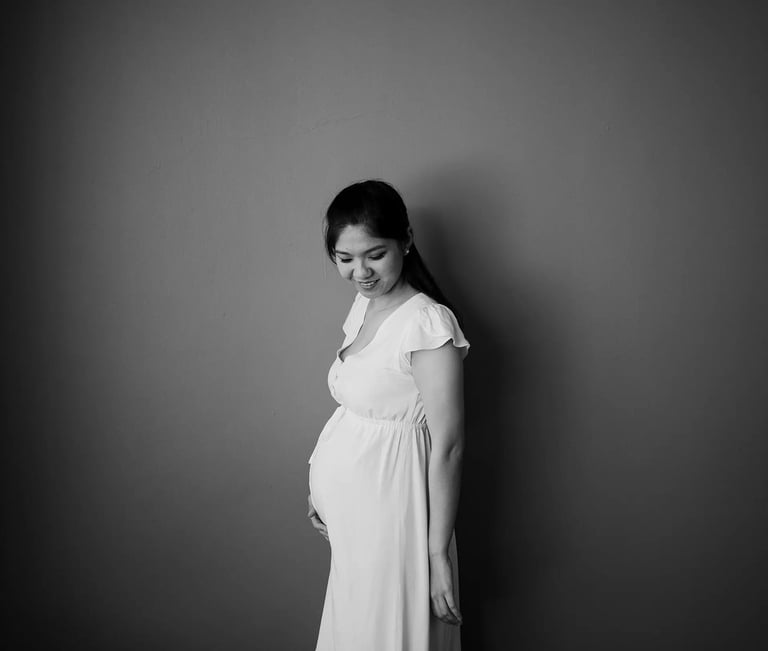 Minimal maternity portrait during a calm family session at Anantara Uluwatu Bali.