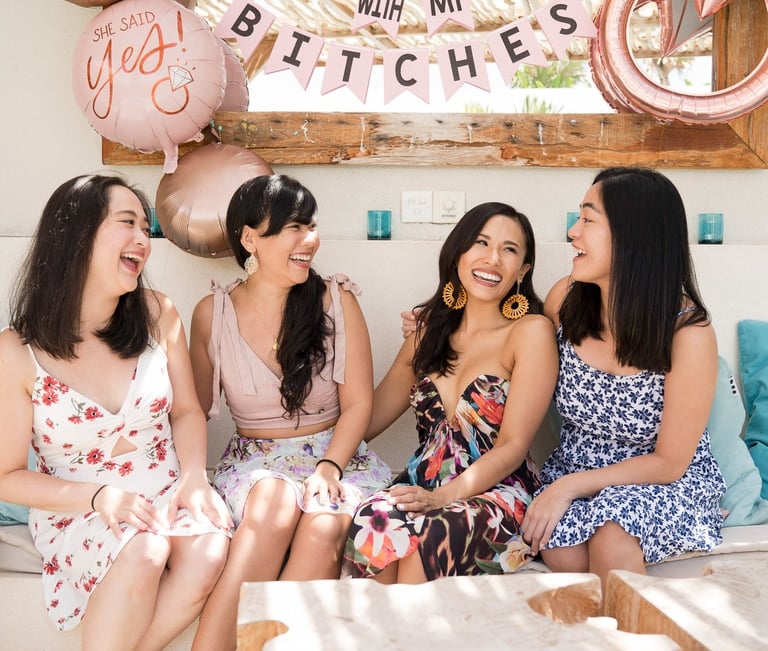 Friends chatting together during Regina bridal party gathering at Villa Seminyak Bali
