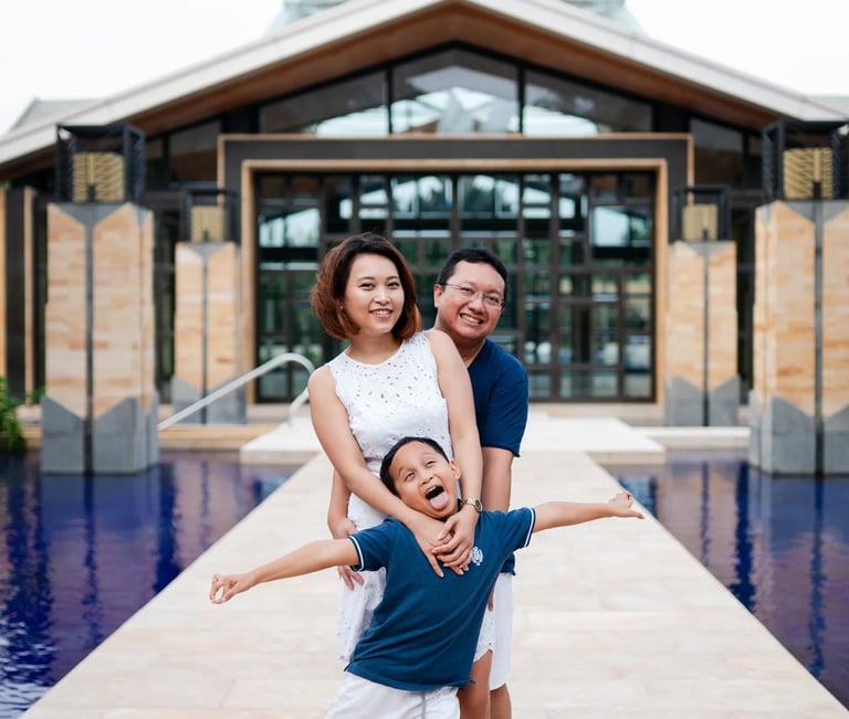 Family portrait near resort entrance at The Mulia Nusa Dua Bali
