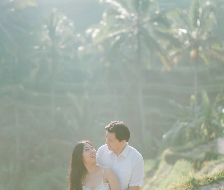 Intimate couple hug during a sunrise photography session at Tegalalang Ubud Bali.