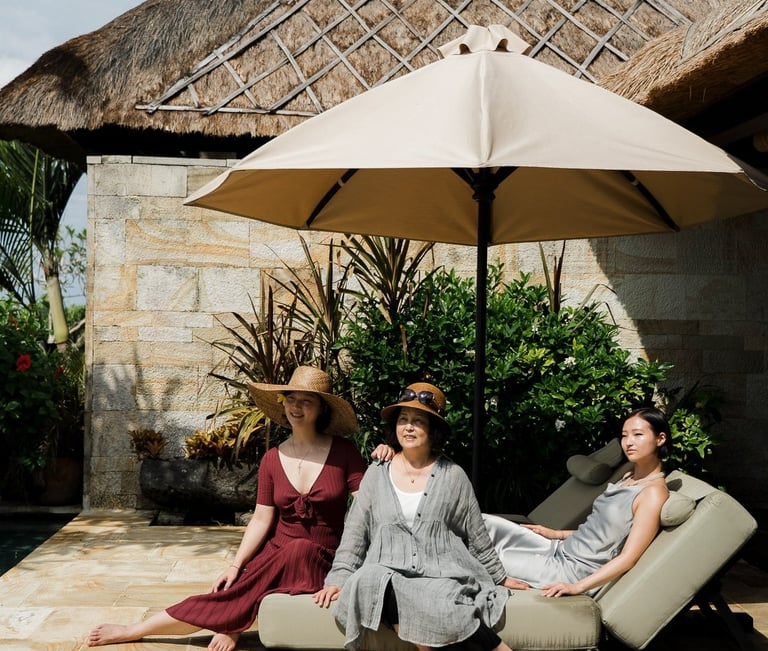Family relaxing by private pool at Bvlgari Resort Uluwatu Bali, luxury villa family photography in Bali